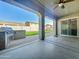 Covered patio with ceiling fan and built-in BBQ at 17346 W Lincoln St, Goodyear, AZ 85338