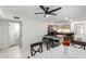 Spacious dining room featuring a serving counter with bar seating and dark wood cabinets at 2112 E Minton Dr, Tempe, AZ 85282