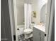 Charming bathroom featuring a shower-tub combo and gray patterned floor tiles at 21491 S 185Th Way, Queen Creek, AZ 85142