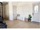 A welcoming entryway with natural light, a bench for seating, and modern accents at 21491 S 185Th Way, Queen Creek, AZ 85142