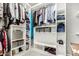 Well-organized walk-in closet with ample shelving and hanging space for efficient storage solutions, enhancing home's functionality at 22319 E Via De Olivos --, Queen Creek, AZ 85142