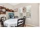 Dining area with a large window and a charming hutch with shelves at 22319 E Via De Olivos --, Queen Creek, AZ 85142