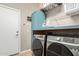 A well-organized laundry room featuring new front-load washer and dryer, offering convenience and efficiency for household chores at 22319 E Via De Olivos --, Queen Creek, AZ 85142