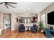 Elegant living space showcasing comfortable seating and views into the kitchen at 22319 E Via De Olivos --, Queen Creek, AZ 85142