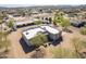 View of custom home with desert landscaping, RV parking, and mountain views at 2349 W Skyline Ln, San Tan Valley, AZ 85144