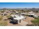 Aerial view of custom home with desert landscaping and RV parking area at 2349 W Skyline Ln, San Tan Valley, AZ 85144