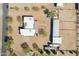 Overhead view of the property with its expansive layout, including the home, outbuildings, and parking areas at 2349 W Skyline Ln, San Tan Valley, AZ 85144