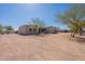 Spacious home with neutral stucco and a sprawling driveway at 2349 W Skyline Ln, San Tan Valley, AZ 85144