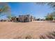 Spacious home with neutral stucco and a sprawling driveway at 2349 W Skyline Ln, San Tan Valley, AZ 85144