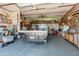 Garage featuring truck and storage, as well as rustic wood-look panelling at 2349 W Skyline Ln, San Tan Valley, AZ 85144