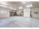 Spacious garage with ample storage, a pegboard for tools, and an abundance of space at 2349 W Skyline Ln, San Tan Valley, AZ 85144