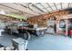 Spacious garage with truck, storage, and rustic wood-look paneling details at 2349 W Skyline Ln, San Tan Valley, AZ 85144