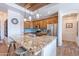 Gourmet kitchen featuring granite countertops and stainless steel appliances at 2349 W Skyline Ln, San Tan Valley, AZ 85144