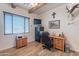 Cozy home office with wood floors, natural light, and a ceiling with beams at 2349 W Skyline Ln, San Tan Valley, AZ 85144