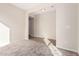 Empty room with tile and carpet featuring an archway at 2530 W Gaby Rd, Phoenix, AZ 85041