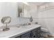 Bathroom featuring a well-lit vanity with modern fixtures and ample counter space at 2650 W Union Hills Dr # 329, Phoenix, AZ 85027