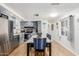 Dining area with a view of the stainless steel appliances in the kitchen at 2650 W Union Hills Dr # 329, Phoenix, AZ 85027