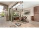 Bright dining area with a sliding glass doors providing easy access to the outdoor entertainment area at 3110 E Cat Balue Dr, Phoenix, AZ 85050