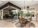 Bright dining area featuring a sliding glass doors that provide easy access to the outdoor entertainment area at 3110 E Cat Balue Dr, Phoenix, AZ 85050