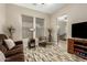 Inviting living room with cozy furniture, natural light and neutral color palette at 3110 E Cat Balue Dr, Phoenix, AZ 85050