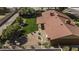 Aerial view of backyard with grass, stone and brick patios at 325 E Aepli Dr, Tempe, AZ 85282