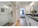 Modern bathroom features a glass-enclosed shower, sleek vanity, and contemporary fixtures at 3302 N 7Th St # 364, Phoenix, AZ 85014