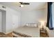 Cozy bedroom with natural light, ceiling fan, and laminate floors at 3302 N 7Th St # 364, Phoenix, AZ 85014