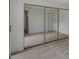 Spacious bedroom featuring mirrored closet doors and neutral carpet at 3309 N 70Th St # 108, Scottsdale, AZ 85251