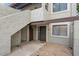 Two-story condo with private entry, red tile roof, neutral stucco, and desert landscaping at 3309 N 70Th St # 108, Scottsdale, AZ 85251