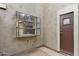 Exterior view features a window and door with textured stucco and neutral color palette at 3309 N 70Th St # 108, Scottsdale, AZ 85251