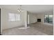 Open-concept living room with tile flooring, carpet, fireplace and lots of natural light at 3309 N 70Th St # 108, Scottsdale, AZ 85251