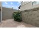 Private patio area with tile flooring and stucco walls, offering a cozy outdoor space at 3309 N 70Th St # 108, Scottsdale, AZ 85251