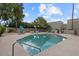 Community pool area features chairs and umbrellas with a crisp and clean look at 3309 N 70Th St # 108, Scottsdale, AZ 85251