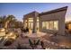 Backyard patio with desert landscaping and mountain views at 34423 N 68Th Way, Scottsdale, AZ 85266