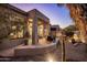 Exterior view of covered patio with desert landscaping and mountain views at 34423 N 68Th Way, Scottsdale, AZ 85266