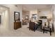 Bright, open living room with modern furniture and decor open to formal dining area at 34423 N 68Th Way, Scottsdale, AZ 85266