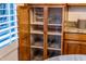 Walk-in kitchen pantry showcasing custom roll-out shelving and convenient storage solutions at 34423 N 68Th Way, Scottsdale, AZ 85266