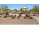 Enjoy the community playground featuring modern equipment, shaded picnic area, and lush green spaces at 3519 S 185Th Dr, Goodyear, AZ 85338