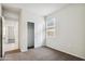 Inviting bedroom with carpet floors, closet, and natural light at 35514 N Breezy Ln, San Tan Valley, AZ 85140