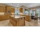 Gourmet kitchen featuring stainless steel appliances and a large center island at 3616 E Kachina Dr, Phoenix, AZ 85044