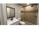 Updated bathroom with tiled shower and modern fixtures at 4231 E Carter Dr, Phoenix, AZ 85042