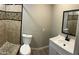 Modern bathroom with tiled shower and updated vanity at 4231 E Carter Dr, Phoenix, AZ 85042