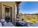 Cozy balcony with comfortable seating and views of the landscaped community at 5350 E Deer Valley Dr # 4408, Phoenix, AZ 85054