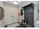 Mudroom with storage, coat rack, and white double doors at 5350 E Deer Valley Dr # 4408, Phoenix, AZ 85054