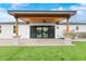 This home features a covered patio with brick flooring and a ceiling fan overlooking the grassy backyard at 6719 N 10Th Pl, Phoenix, AZ 85014