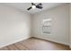 Bright bedroom featuring wood floors and a window providing plenty of natural light at 6719 N 10Th Pl, Phoenix, AZ 85014