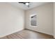 Bright bedroom featuring wood floors and a window providing plenty of natural light at 6719 N 10Th Pl, Phoenix, AZ 85014