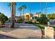 Beautifully landscaped front yard with mature trees and well-maintained lawn at 8270 E Corrine Dr, Scottsdale, AZ 85260