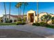 Beautiful home featuring mature landscaping and circular driveway at 8270 E Corrine Dr, Scottsdale, AZ 85260