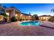 Inviting pool area with lush landscaping and ample space for outdoor enjoyment at 8270 E Corrine Dr, Scottsdale, AZ 85260